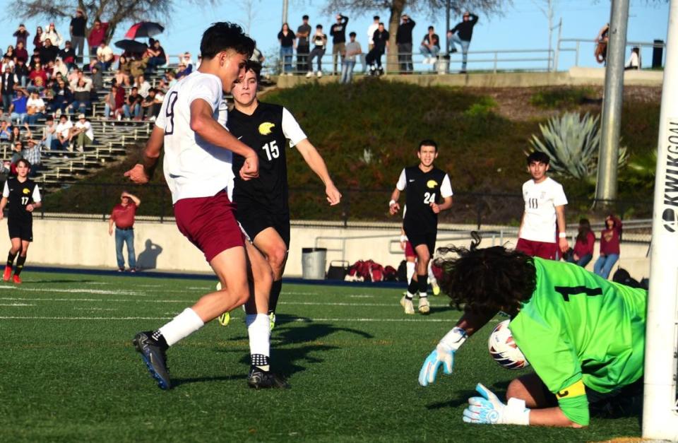 Golden Valley High senior Carlos Miranda (3) scores on a rebound past Del Oro goalie James Tibbetts. It was Miranda’s second goal during a 4-2 win over Del Oro in the Sac-Joaquin Section Division II championship match at Cosumnes River College in Sacramento, Calif. on Saturday, Feb. 24, 2024.