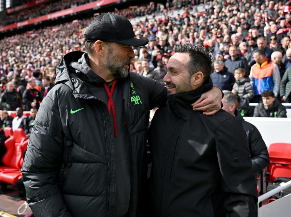 Mutual admiration: Jurgen Klopp and Roberto De Zerbi shared a warm moment before Liverpool beat Brighton 2-1 at Anfield (Liverpool FC via Getty Images)