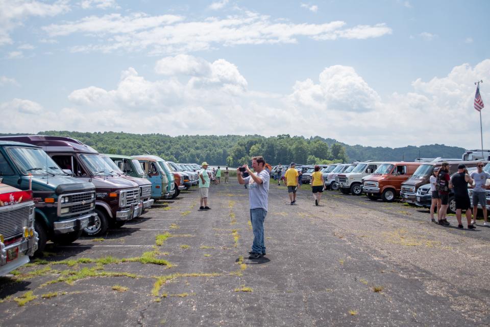 Over 300 vans made their way to the Salt Fork Beach area for a public van show. The 49th Van Nationals brought drivers from all across the United States, showcasing new and vintage custom vans. The event culminated on Saturday evening at the fairgrounds with 'Burning Van.' The over 700 van owners at the fairgrounds were able to leave messages and notes on the giant wooden van, which was set on fire, similar to the Burning Man festival.