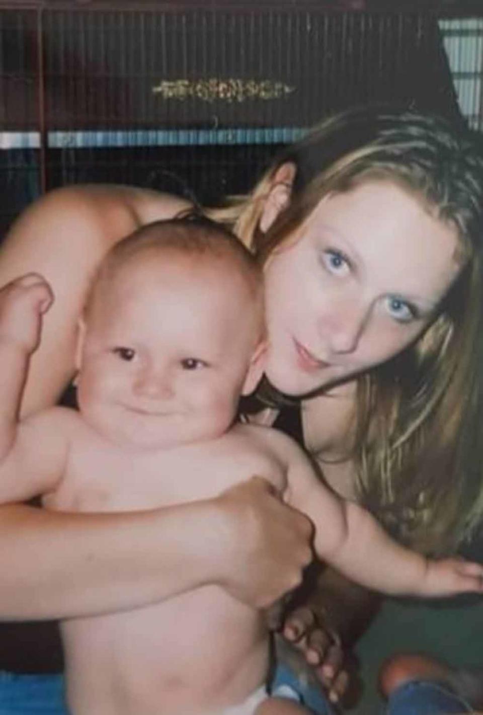 Sarah aged 18 with her eldest son, Danny, in 2004 (Collect/PA Real Life). 