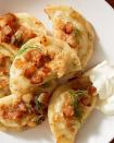 <p>When you're looking for something warm, comforting, and carb-y, do Polish pierogi come to mind? We think they should, and this cheesy dill version certainly satisfies on all fronts. Loaded with sharp white cheddar, sweet <a href="https://www.delish.com/cooking/recipe-ideas/a28700143/how-to-caramelize-onions/" rel="nofollow noopener" target="_blank" data-ylk="slk:caramelized onions;elm:context_link;itc:0;sec:content-canvas" class="link ">caramelized onions</a>, and creamy <a href="https://www.delish.com/cooking/recipe-ideas/recipes/a50630/perfect-mashed-potatoes-recipe/" rel="nofollow noopener" target="_blank" data-ylk="slk:mashed potatoes;elm:context_link;itc:0;sec:content-canvas" class="link ">mashed potatoes</a>, the only thing more gratifying than making them from scratch is stuffing them in your mouth. 😋</p><p>Get the <strong><a href="https://www.delish.com/cooking/recipe-ideas/a37941002/pierogi-recipe/" rel="nofollow noopener" target="_blank" data-ylk="slk:Dill & Cheddar Pierogis recipe;elm:context_link;itc:0;sec:content-canvas" class="link ">Dill & Cheddar Pierogis recipe</a></strong>.</p>