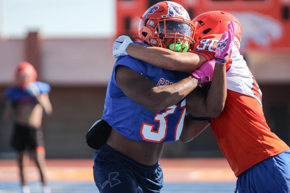 Canutillo junior linebacker TJ Locklin, left, is a leader for the Eagles this season. He helped lead the Eagles to the third round of last year's Class 5A, Division II playoffs.