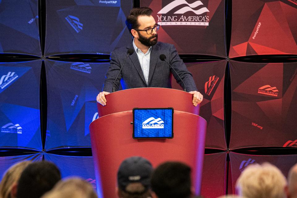 Matt Walsh pauses for a moment during his talk on April 4, 2023.