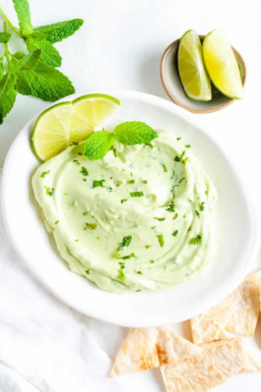 <p>It's Not Complicated</p><p>It is light, silky smooth and refreshing with an extra flavor boost from mint.</p><p><strong>Get the recipe: <a href="https://itsnotcomplicatedrecipes.com/avocado-yoghurt-and-mint-dip/" rel="nofollow noopener" target="_blank" data-ylk="slk:Avocado Yogurt Mint Dip;elm:context_link;itc:0;sec:content-canvas" class="link ">Avocado Yogurt Mint Dip </a></strong></p>