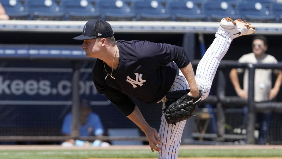 Mar 27, 2023;  Tampa, Florida, USA;  New York Yankees starting pitcher Clarke Schmidt (86) throws a pitch against the Tampa Bay Rays during the first inning at George M. Steinbrenner Field.