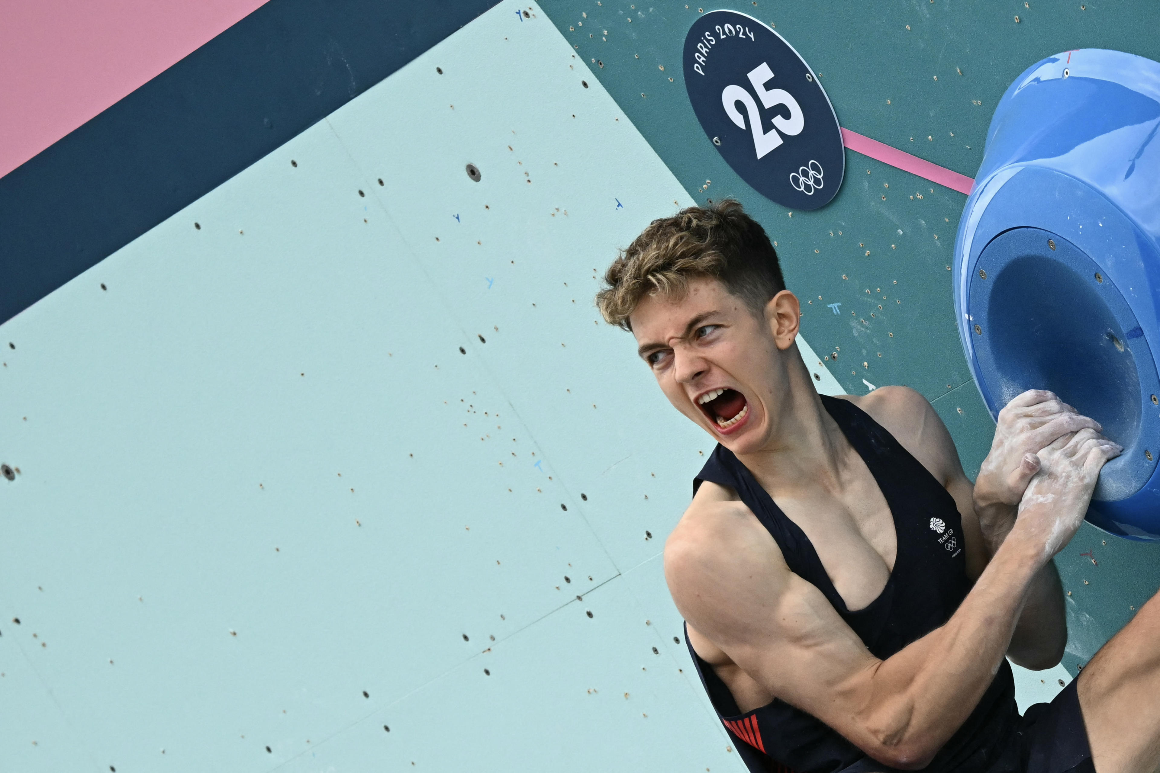 British Toby Roberts competes in the men's sport climbing boulder final during the Paris 2024 Olympic Games at Le Bourget Sport Climbing Venue in Le Bourget on August 9, 2024. (Fabrice Coffrini/AFP)