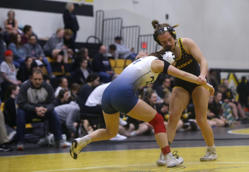 Waverly-Shell Rock’s Camille Schult wrestles Pleasant Valley’s Abigail Meyrer in the 120-pound finals Saturday, Dec. 9, 2023 at the Vinton-Shellsburg Girls Invitational in Vinton, Iowa.