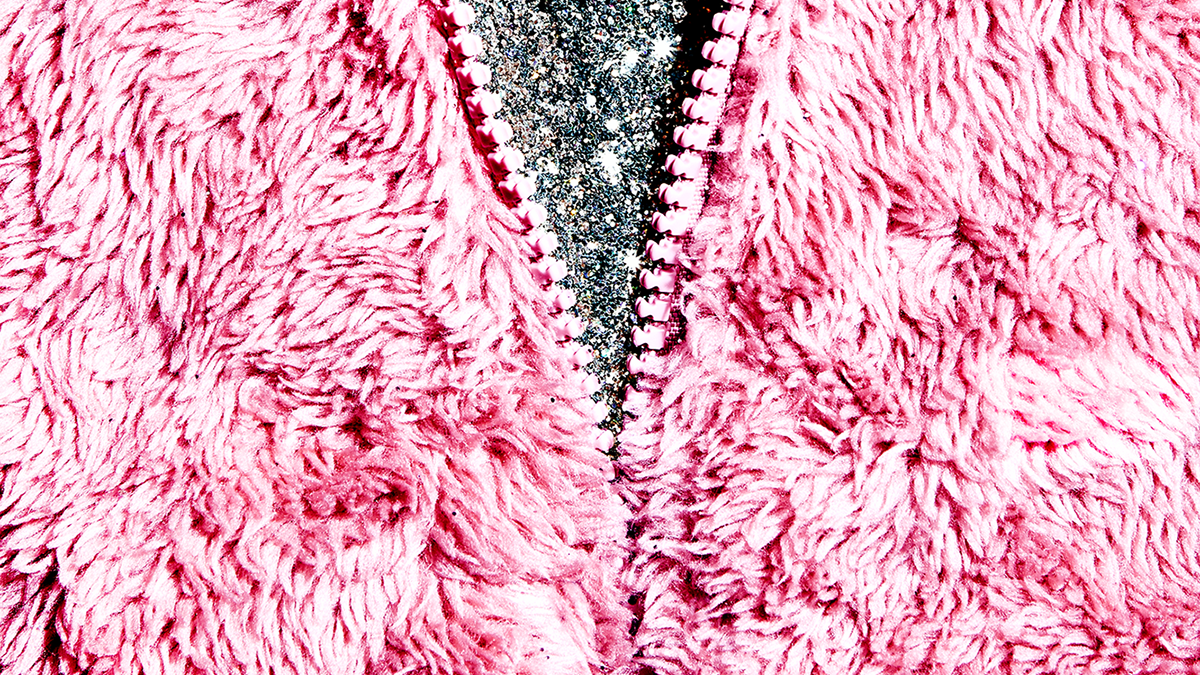 textured fabric and zipper referencing vagina