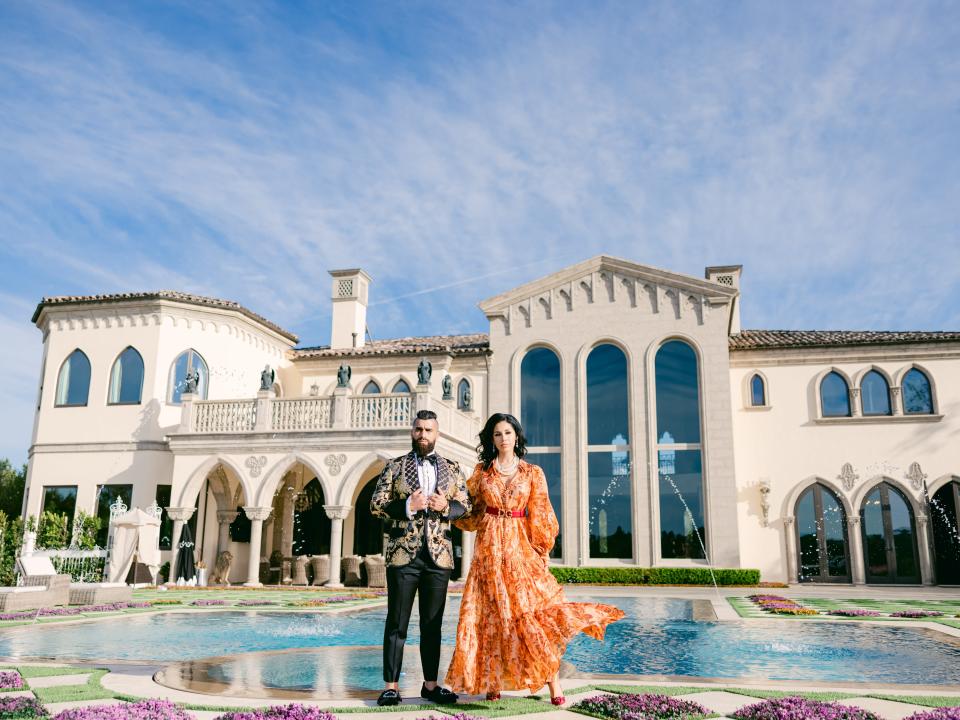 Owners Robert and Krystal Rivani standing outside their home.