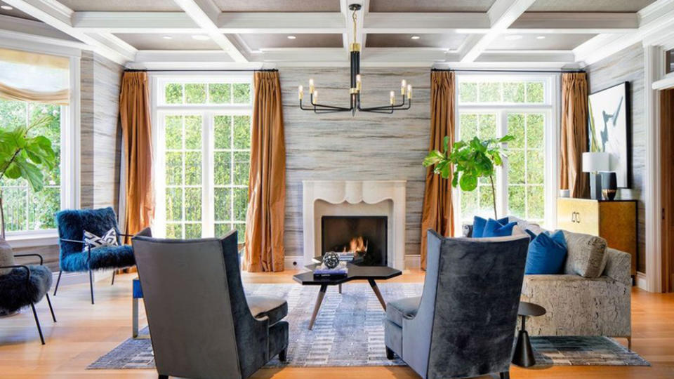 One of the room’s in the home with a wood-burning fireplace. - Credit: Realtor.com