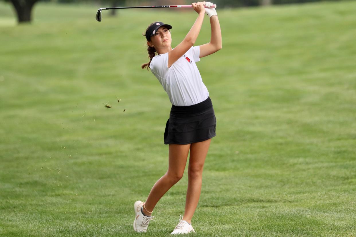 Olivia DeGori watches her ball’s flight after hitting out of the fairway during Moon Area’s final regular season match against Blackhawk at Blackhawk Golf Course on Monday.