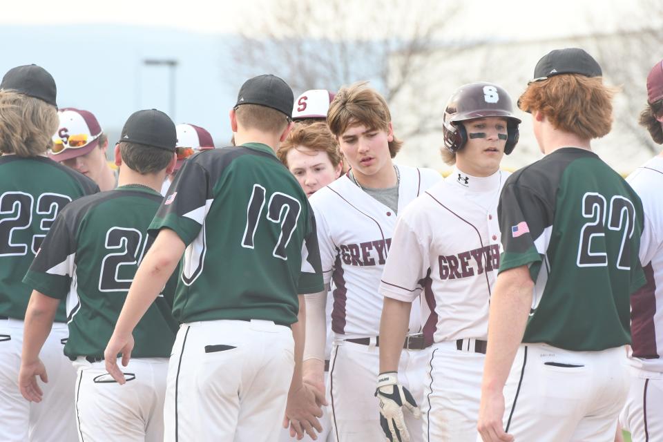 Shippensburg and James Buchanan shake hands after the Greyhounds defeated the Rockets 10-0 in five innings on Wednesday, April 5, 2023