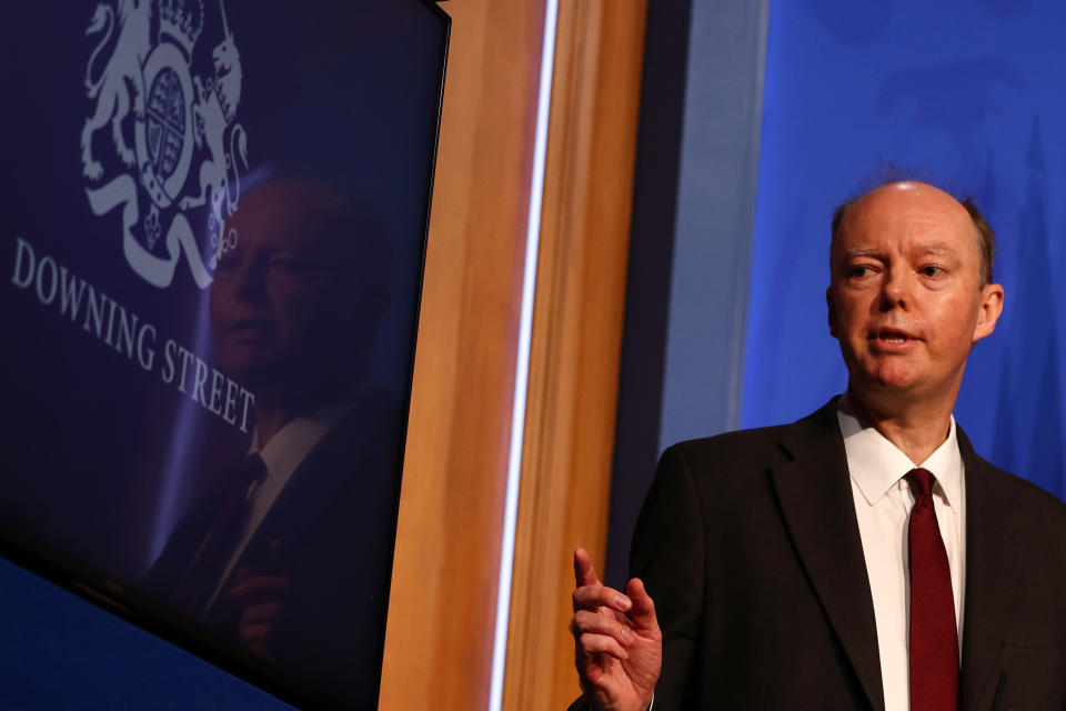 LONDON, ENGLAND - DECEMBER 08: Britain's Chief Medical Officer for England Chris Whitty speaks at a press conference at 10 Downing Street on December 8, 2021 in London, England. During the press conference, the Prime Minister announced that the government will implement its “Plan B” due to the rapid transmission of the Omicron variant. The work from home guidance has been reintroduced, mask wearing at public indoor venues will be enforced and mandatory COVID-19 vaccination passports will be required for entrance into crowded venues such as nightclubs. (Photo by Adrian Dennis-WPA Pool/Getty Images)