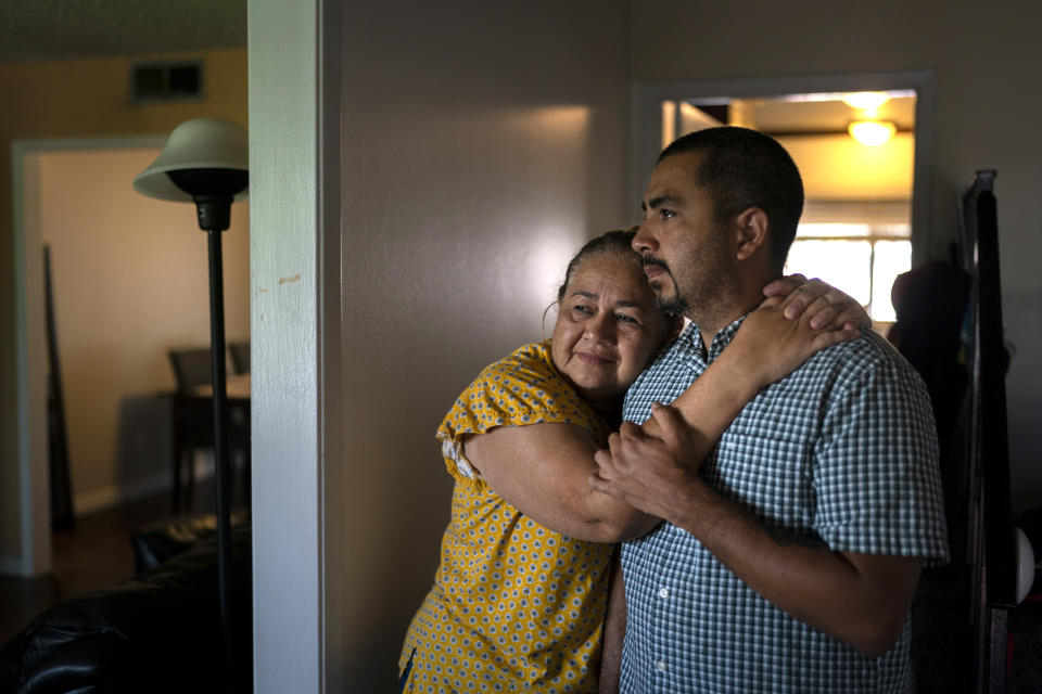 Ana Sandoval hugs her son Henry Martinez in Compton, Calif. (Jae C. Hong / AP file)