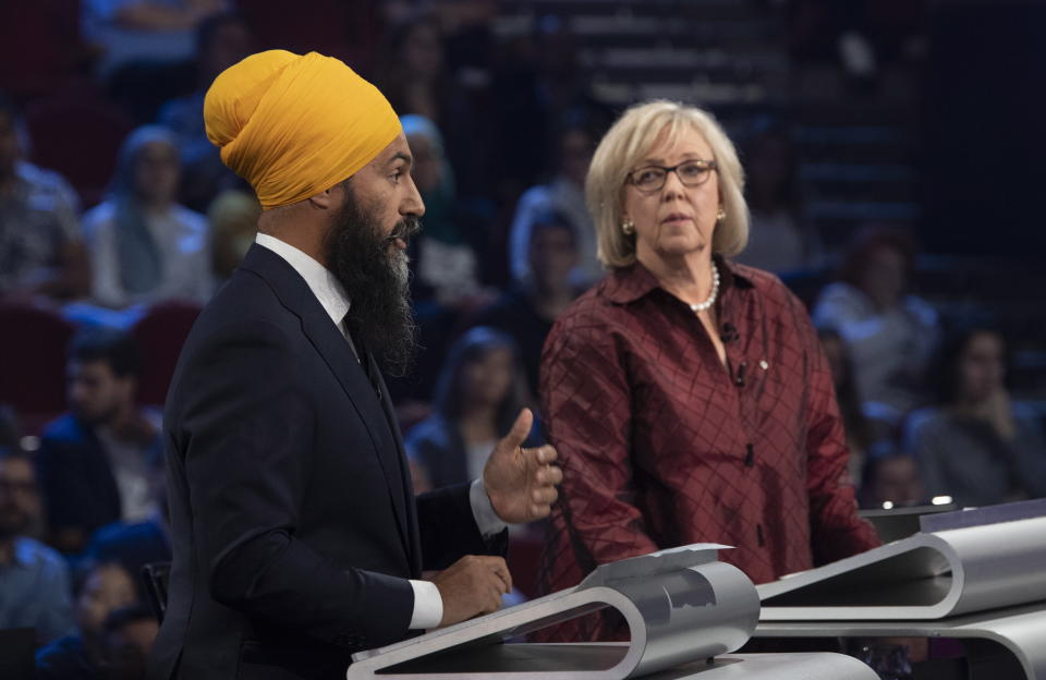 NDP leader Jagmeet Singh, left, and Green Party leader Elizabeth May take part in the Federal leaders French language debate in Gatineau, Quebec, Thursday, Oct. 10, 2019. (Adrian Wyld/The Canadian Press via AP)