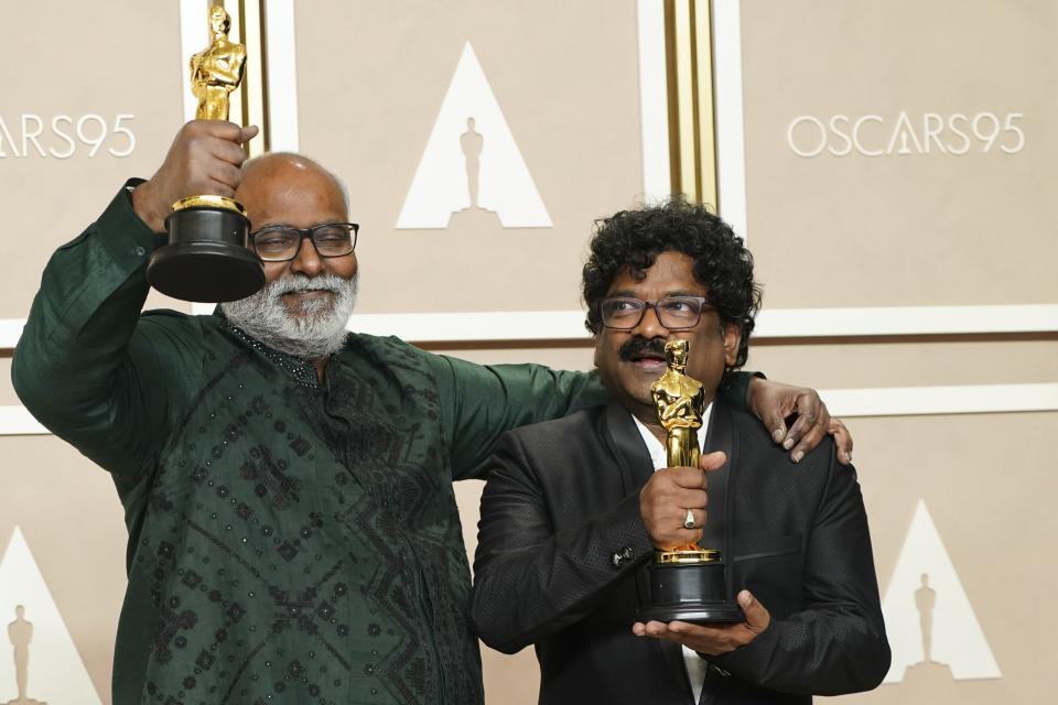 M.M. Keeravaani, left, and Chandrabose, winners of the award for best original song for "Naatu Naatu" from "RRR", pose in the press room at the Oscars on Sunday, March 12, 2023, at the Dolby Theatre in Los Angeles. (Photo by Jordan Strauss/Invision/AP)