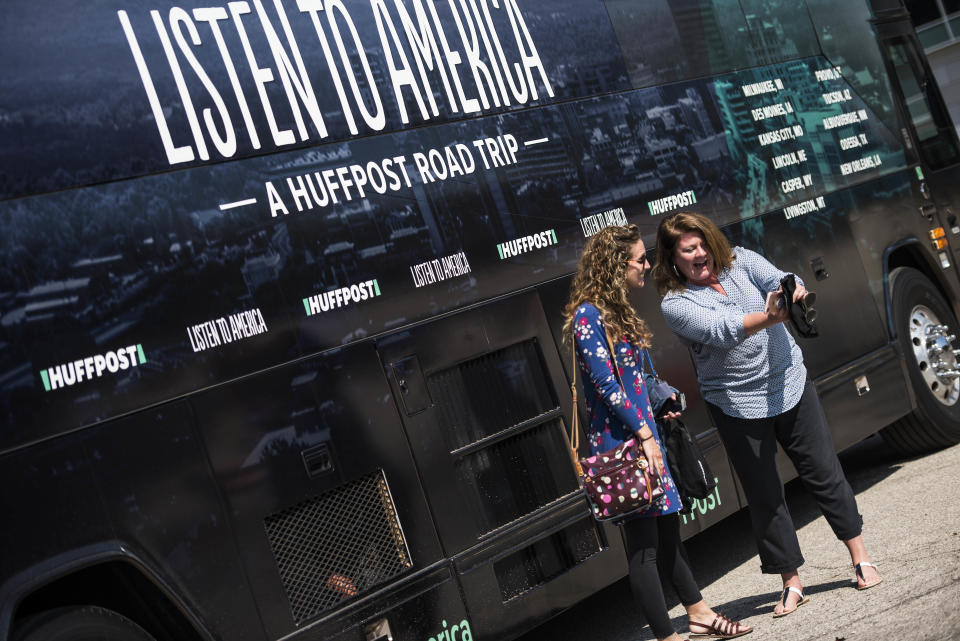 Sarah Gee and Lorrie Levi take a selfie with the bus.