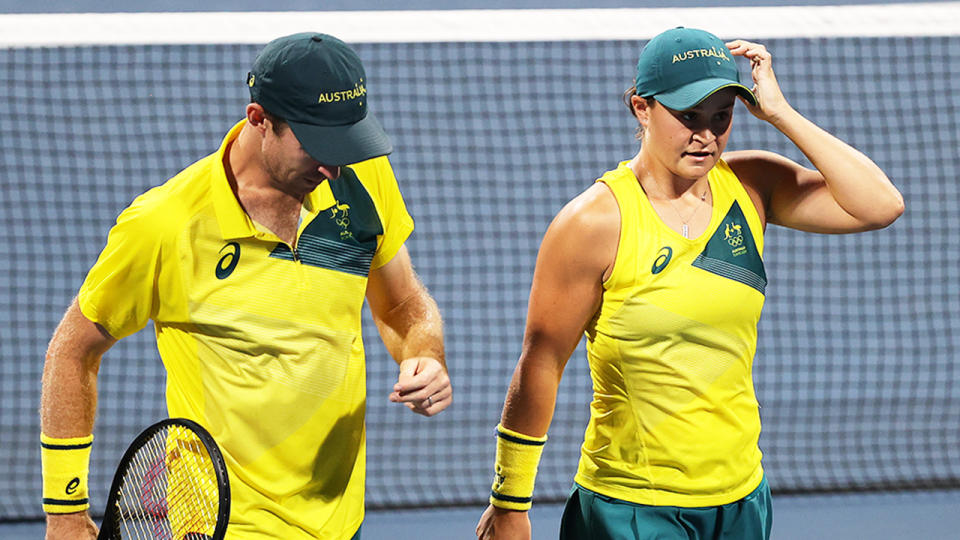 Ash Barty (pictured right) and John Peers (pictured left) looking dejected during the semi-final of mixed doubles at the Tokyo Olympics.