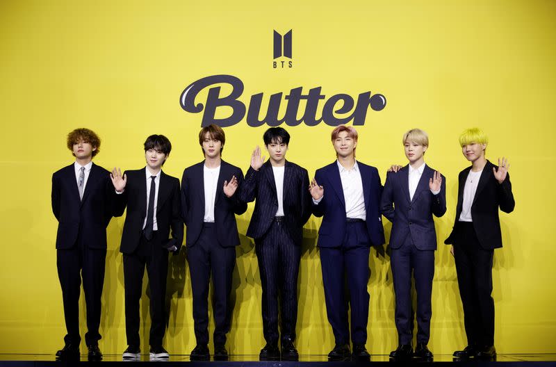 Members of K-pop boy band BTS pose for photographs during a photo opportunity promoting their new single 'Butter' in Seoul