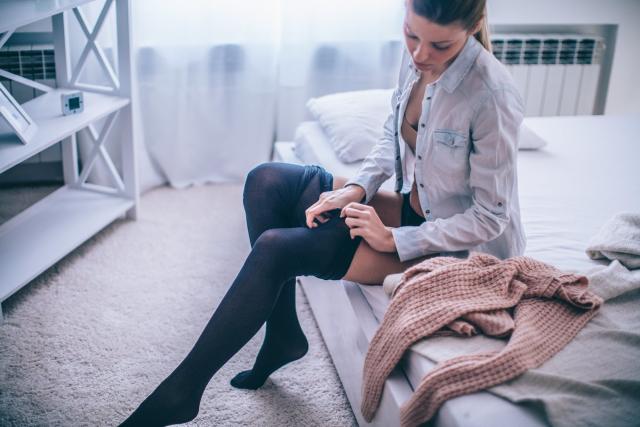 What Our Editors Think About Wearing Tights Under Jeans