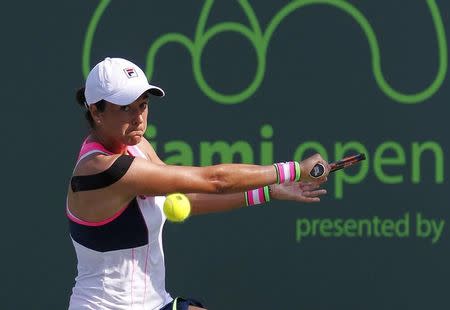 Silvia Soler-Espinosa hits a backhand against Victoria Azarenka (not pictured) on day two of the Miami Open at Crandon Park Tennis Center. Azarenka won 6-1, 6-3. Mandatory Credit: Geoff Burke-USA TODAY Sports