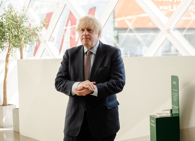 Prime Minister Boris Johnson visits the M&S clothing department and other retail outlets in Westfield Stratford, in London