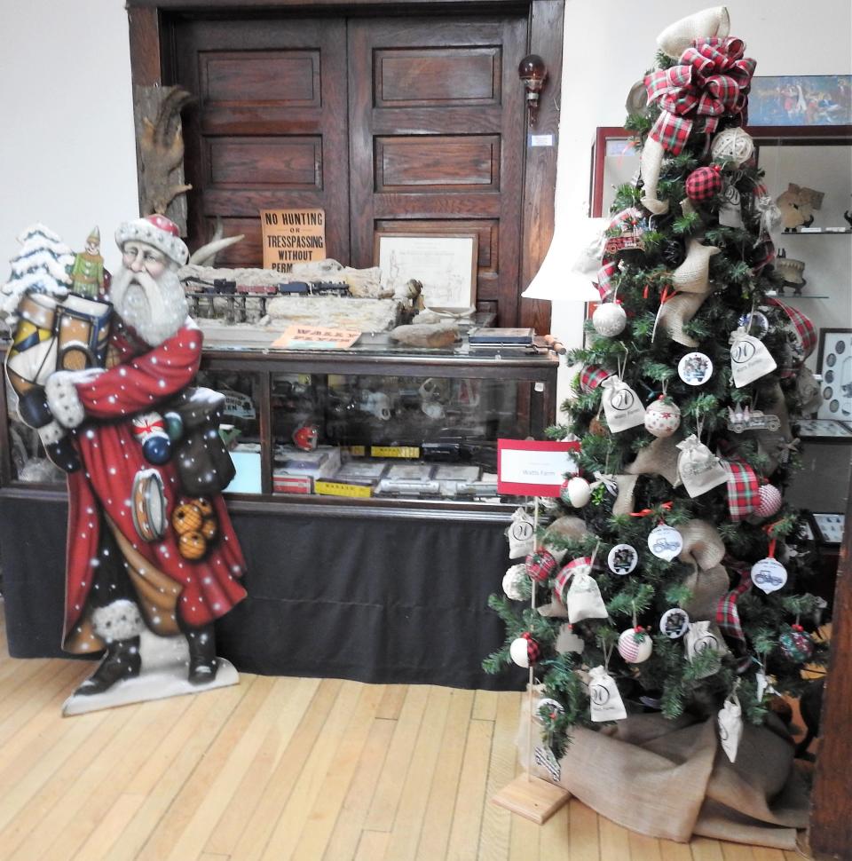 A Christmas Tree from Watts Farms of Granville is the first of the Festival of Trees at the Walhonding Valley Historical Society Museum donated from outside Coshocton County.