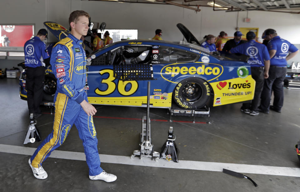 Matt Tifft leaves his garage after a practice session for the NASCAR Daytona 500 auto race at Daytona International Speedway, Friday, Feb. 15, 2019, in Daytona Beach, Fla. (AP Photo/John Raoux)