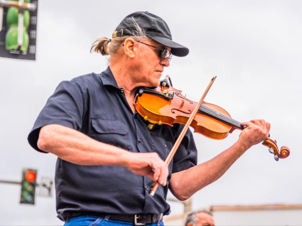 A performance at a Mardi Gras block party, Lake Charles, Louisiana, 2023 (Kathryn Shea Duncan)