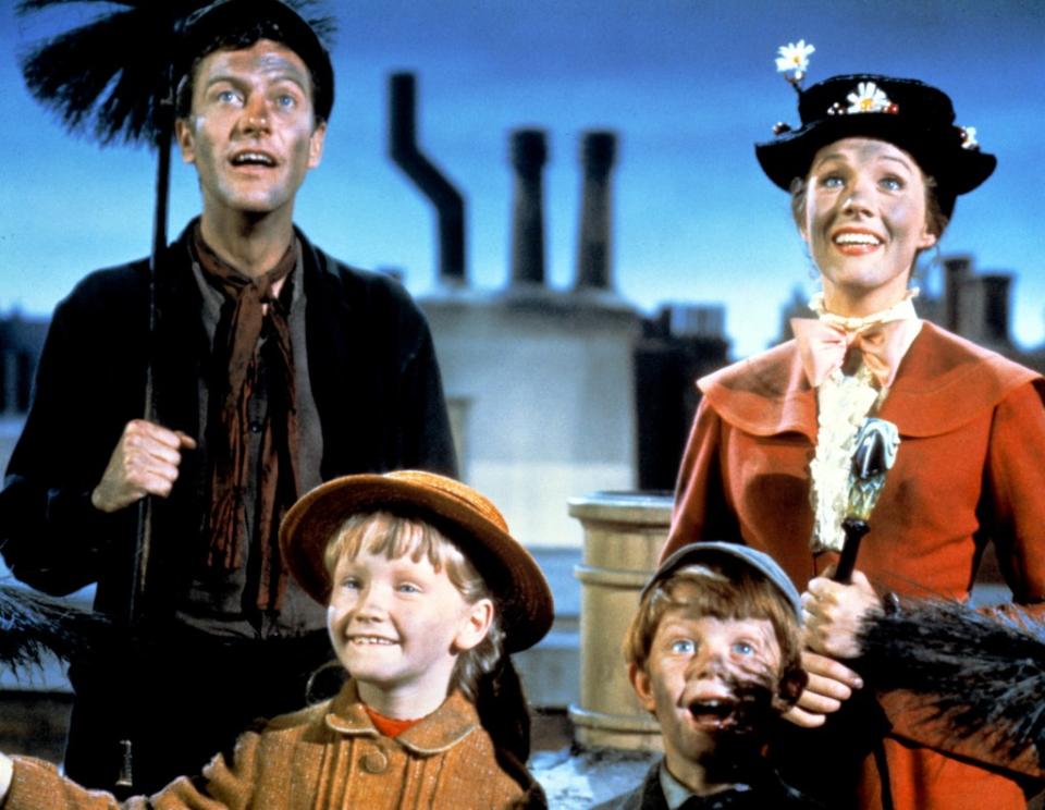 Dick Van Dyke, Julie Andrews, Karin Dotrice and Matthew Garber in a scene from “Mary Poppins” (1964)