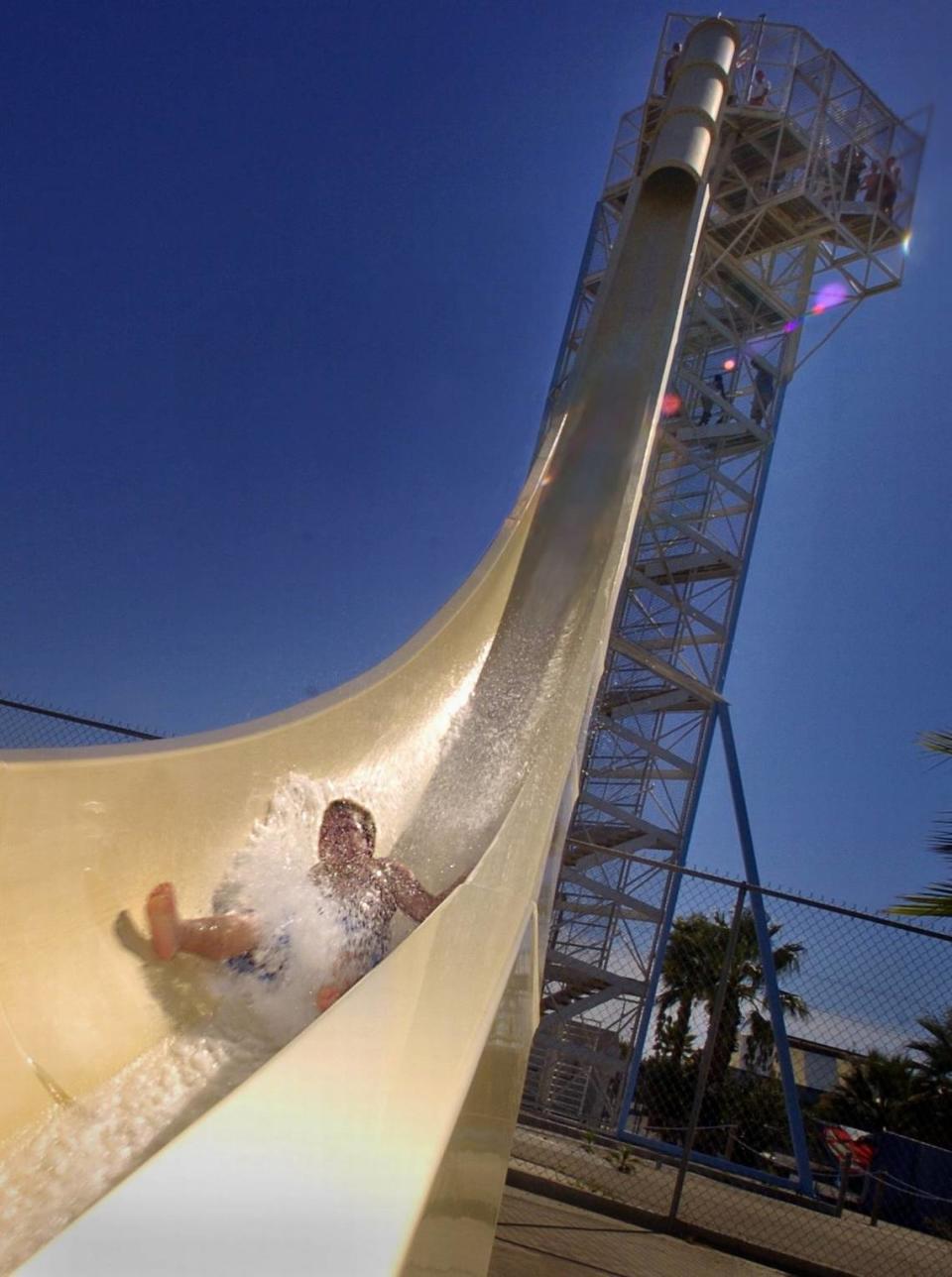 This September 2004 photo of the Manteca Waterslides’ V-Max shows first-time slider Johnathan Barnett, 8, of Modesto making the maiden voyage as he braved the decent from the top of the tower.