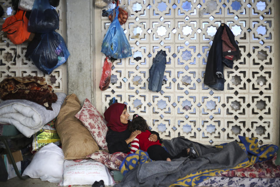 Palestinians take shelter from the Israeli bombardment of the Gaza Strip in the Gaza European Hospital in Khan Younis, Tuesday, Dec. 26, 2023. (AP Photo/Hatem Ali)