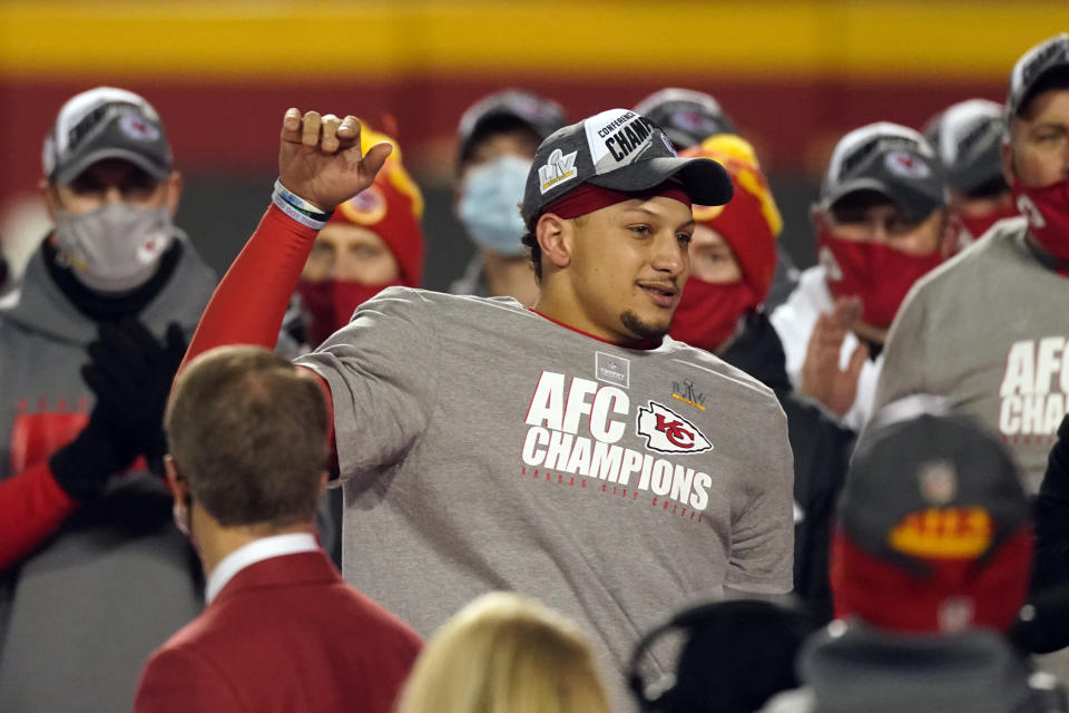 Kansas City Chiefs quarterback Patrick Mahomes celebrates with teammates after the AFC championship NFL football game against the Buffalo Bills, Sunday, Jan. 24, 2021, in Kansas City, Mo. The Chiefs won 38-24. (AP Photo/Charlie Riedel)