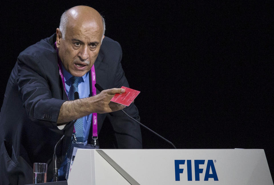 FILE - In this Friday, May 29, 2015 file photo Jibril Rajoub, president of the Palestinian Football Association speaks during the 65th FIFA Congress held at the Hallenstadion in Zurich, Switzerland. FIFA has banned the head of the Palestinian Football Association from attending soccer games for a year for inciting hatred and violence toward Lionel Messi. Jibril Rajoub called on Arab soccer fans to burn Messi posters and shirts if he participated in an Argentina game in Israel in June. (Patrick B. Kraemer/Keystone via AP, File)