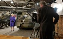 <p>For the very first time in history, the Queen taped her Christmas message entirely on location outside of a royal residence. Here, she stands in front of tanks at Combermere Barracks in Windsor, as the theme of her address that year was a tribute to the armed services.</p>