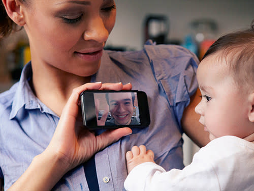 mother and baby chatting on a video call