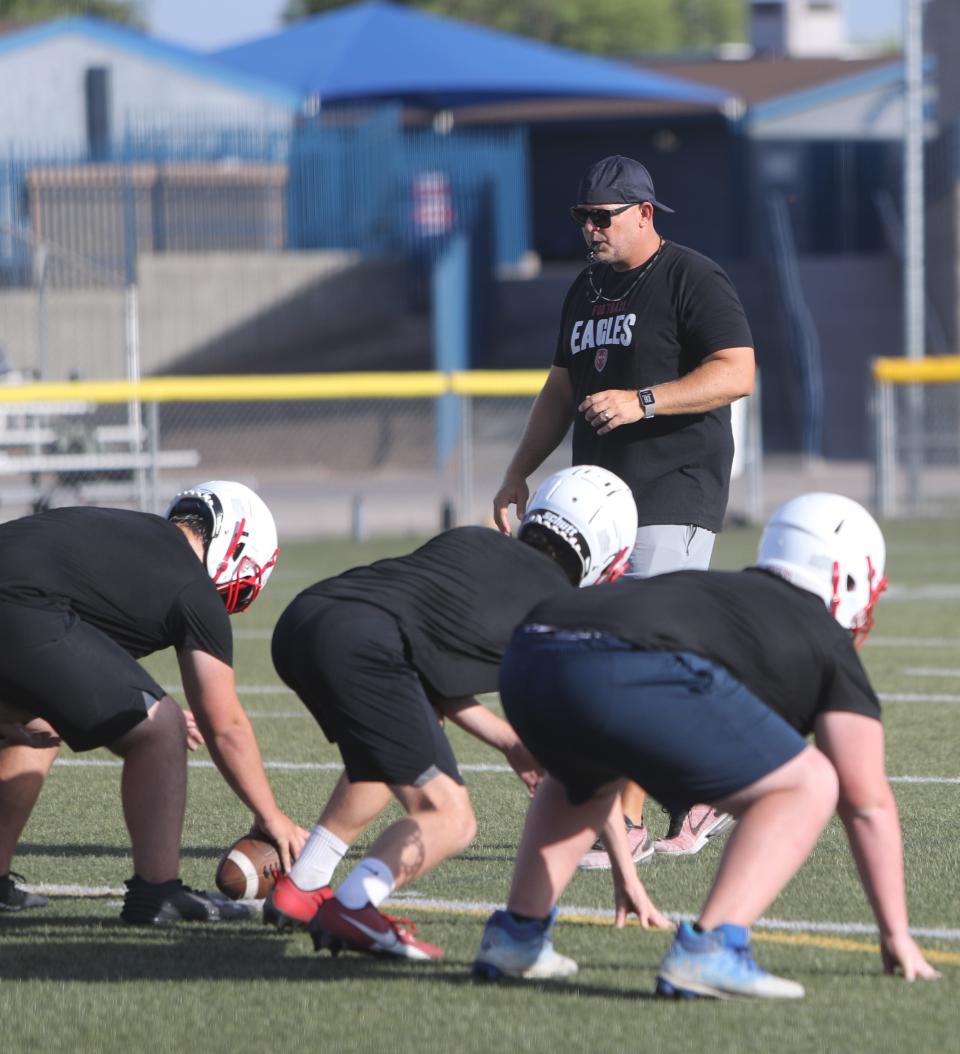 Head coach Mike Sheahan coaches football players through practice at Scottsdale Christian High School in Paradise Valley on July 24, 2023.