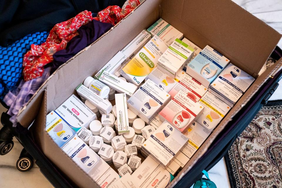 Dr. Saba's supplies include three large suitcase with inhalers, stethoscopes, antibiotics and more.