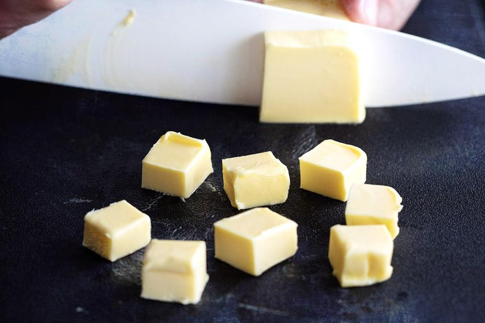 Cut the butter into cubes so they will melt faster.