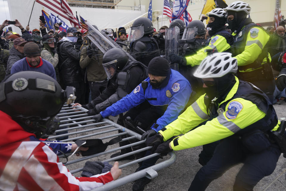 Rioters at the U.S. Capitol on Jan. 6, 2021, in Washington. (AP Photo/John Minchillo)