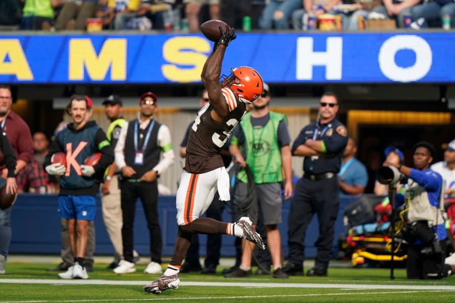 Cleveland Browns running back Jerome Ford catches a pass before falling into the end zone for a touchdown during the first half of an NFL football game against the Los Angeles Rams, Sunday, Dec. 3, 2023, in Inglewood, Calif. (AP Photo/Ryan Sun)