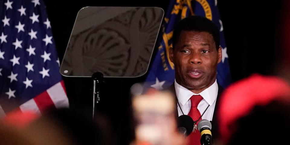 Herschel Walker speaks to supporters during an election night watch party