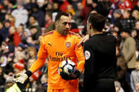 Soccer Football - FA Cup Third Round - Nottingham Forest vs Arsenal - The City Ground, Nottingham, Britain - January 7, 2018 Arsenal's David Ospina speaks to the assistant referee after Nottingham Forest's Kieran Dowell scores their fourth goal from the penalty spot Action Images via Reuters/Carl Recine