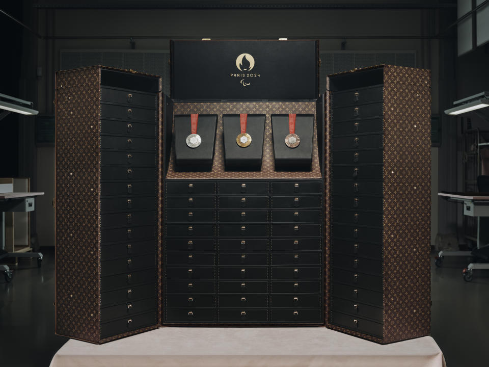 The Vuitton trunk in Monogram canvas houses 468 medals in special drawers.