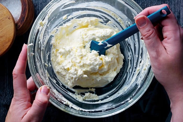 Mixing cream cheese and mayo for Pioneer Woman Million Dollar Dip 