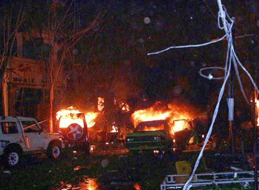 File photo taken in the early hours of October 13, 2002, shows vehicles and buildings in flames after deadly twin bomb attacks on a bar and nightclub in Kuta on Indonesia's resort island of Bali. The attacks triggered a long crackdown on terrorism in Indonesia, focused on weakening the Al-Qaeda-linked Jemaah Islamiyah (JI) terror network responsible for the bombings