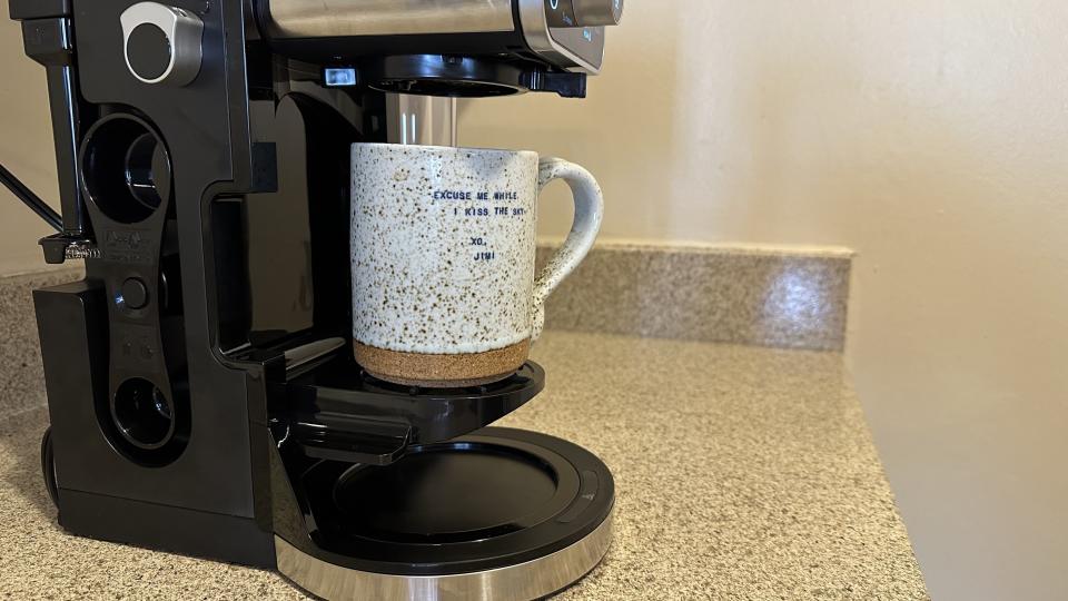 Fold down platform for coffee cups and smaller vessels