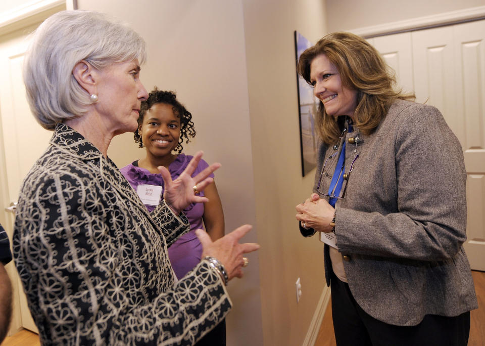 Health and Human Services Secretary Kathleen Sebelius, left, speaks with Lydia Best, Medical Director at Covenant Community Care and Dr. Susan Taylor, Behavioral Health Provider, right, during a tour of the facility prior to her announcement, Wednesday, June, 20, 2012, in Detroit. The Obama administration will expand community health centers in 41 states, the District of Columbia, Puerto Rico and the Northern Mariana Islands, Sebelius announced Wednesday. (AP Photo/The Detroit News, Clarence Tabb, Jr.)