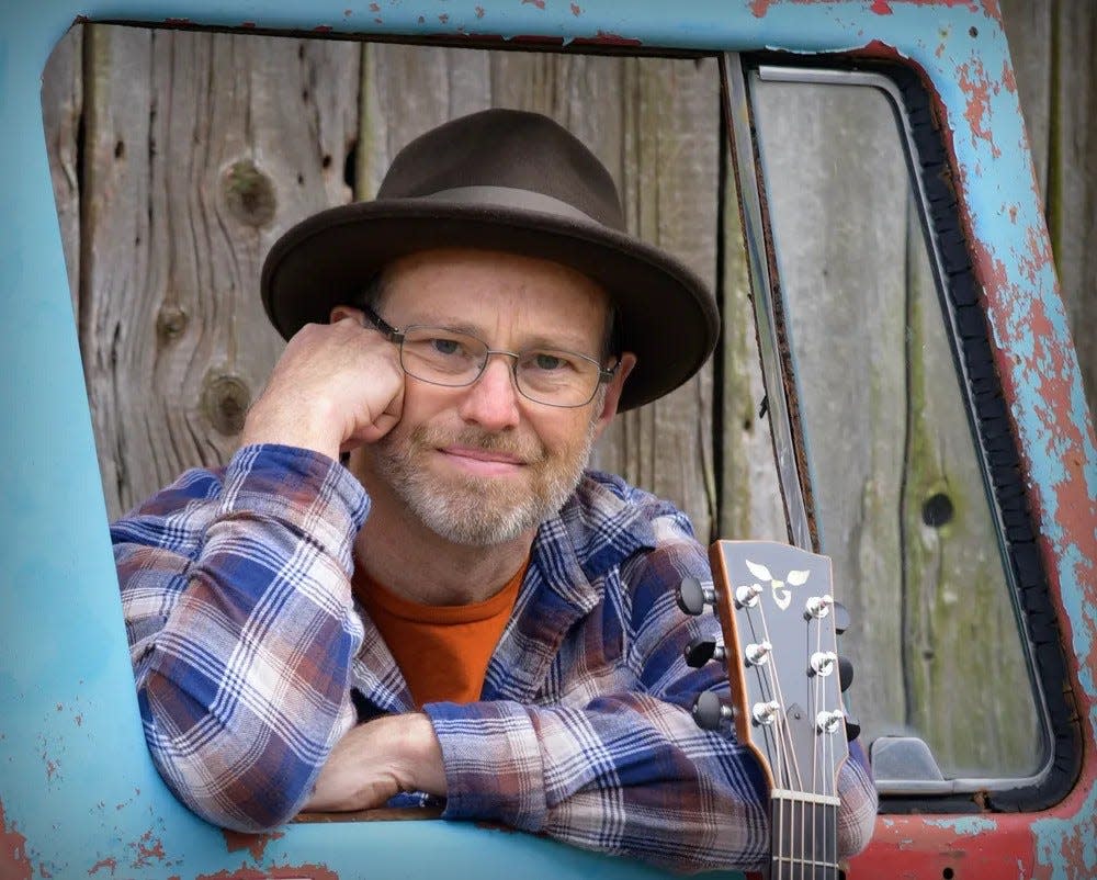 Michigan-based singer-songwriter Andy Baker will be the featured act at the Columbus Folk Music Society's monthly coffeehouse concert on Saturday at the Columbus Mennonite Church.