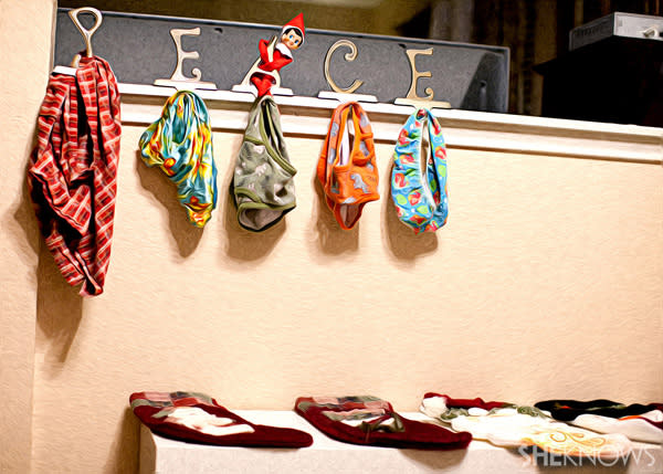 Elf on the Shelf idea 4: Elfie Rojo trading stocking for undergarments